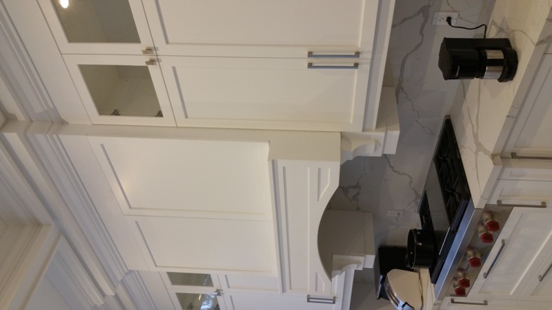 Limestone home with columned entry
