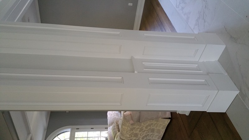 Limestone home with columned entry